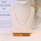 Double chain necklace with small orange beads
