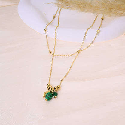 Double chain necklace with green pendants
