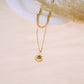 Double chain necklace with pendant and colored stone