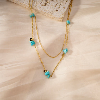 Double chain necklace with 5 blue stones