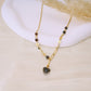 Chain necklace with colored stones