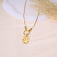 Chain necklace with white pearls and hammered pendant
