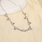 Silver link necklace with round hammered pendants