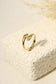 Golden hands ring