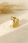 Wide ring with white stone