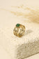 Wide ring with green stone