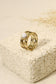 Wide ring with white stone