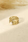 Wide ring with white stone