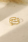 Double line ring with mother-of-pearl and knot