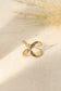 Hammered cross ring