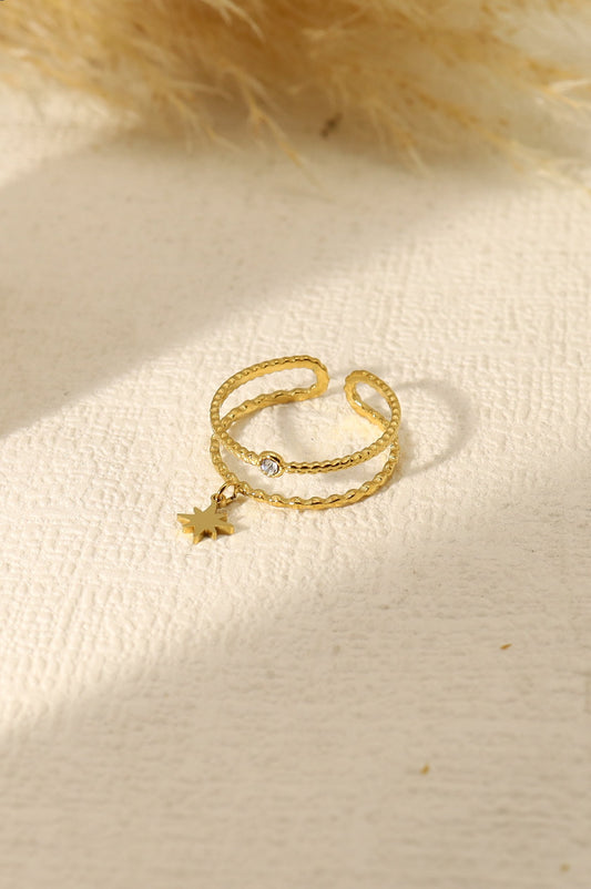 Bague double anneaux, étoile et strass dorée