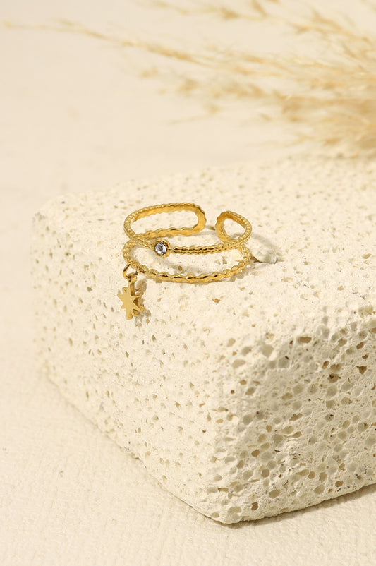Bague double anneaux, étoile et strass dorée