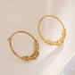 Flower circle earrings