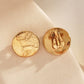 Round hammered clip-on earrings