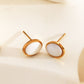 Oval earrings with white stone