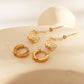 Triple pair of heart-shaped hoop earrings