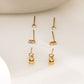 Triple pair of heart and rhinestone hoop earrings