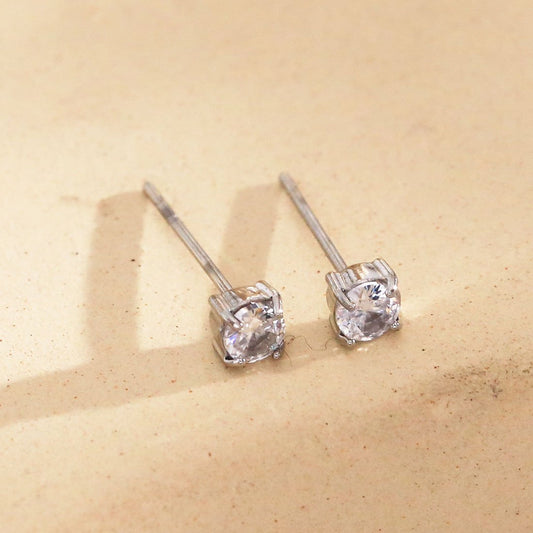 Boucles d'oreilles simples dorées à strass