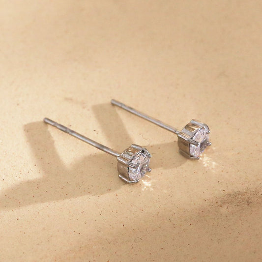 Boucles d'oreilles simples argentées à strass