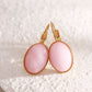 Dangling oval pink stone earrings