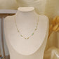 Chain necklace with green and white pearls