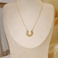 Necklace with half sun pendant