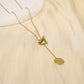 Square necklace in golden Y with ring