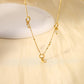 Necklace with chain trio rings with pendants