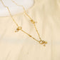 Necklace with chain trio rings with pendants