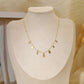 Chain necklace with multiple hammered drop pendants