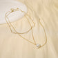 Collier double chaîne avec perles en Y