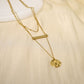 Triple chain necklace with bar and hammered circle