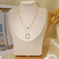 Double chain necklace with ring and round