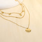 Triple chain multi round necklace