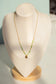 Pearl necklace with clover pendant