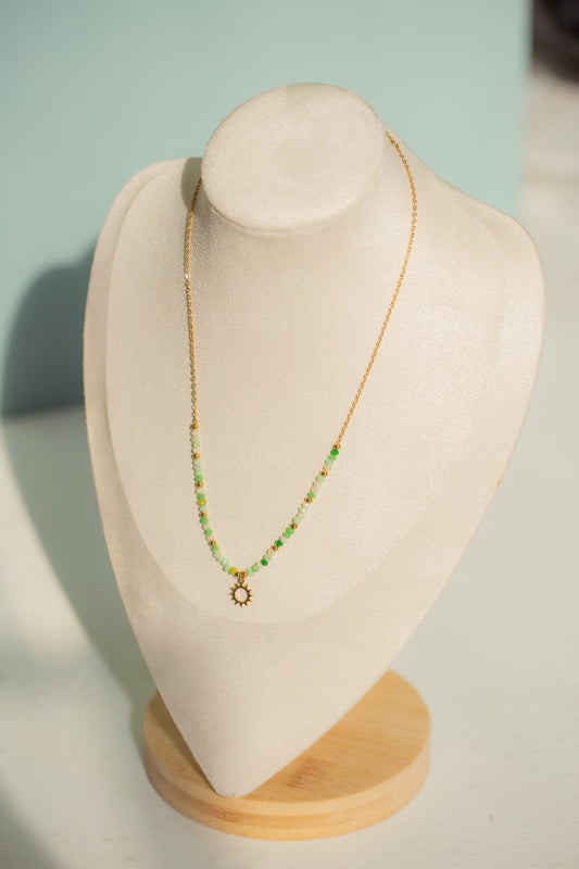 Collier perle avec pendentif soleil