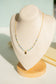 Collier perle avec pendentif rond