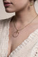 Gold circle and bar necklace