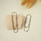 Golden double chain dangling earrings