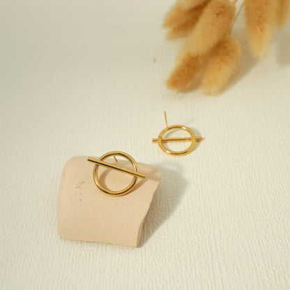 Boucles d'oreilles dorées cercle barré