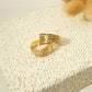 Golden multi-line hoop earrings