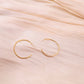 Silver wavy hoop earrings