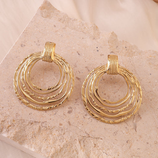 Boucles d'oreilles dorées rondes