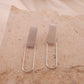 Golden dangling earrings