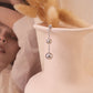 Golden triple ball earrings