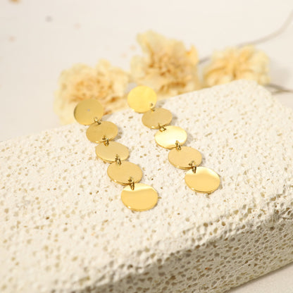 Golden earrings with 5 dangling pellets