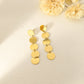 Golden earrings with 5 dangling pellets