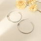 Boucles d'oreilles dorées cercles avec nœud
