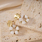 Earring with green stones