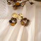 Earring with green stones
